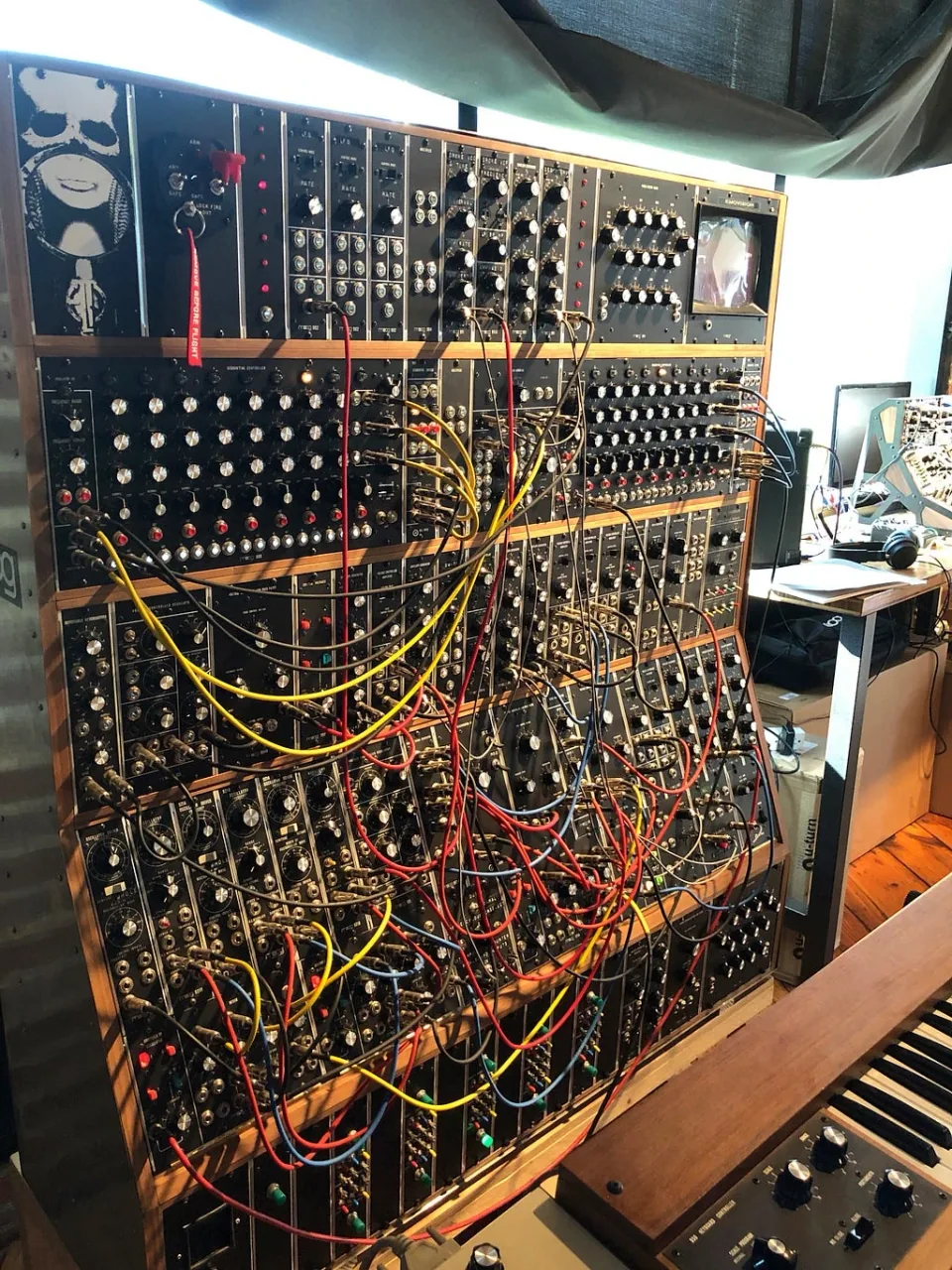 Synthesizers and patch cables inside the Moog Music factory