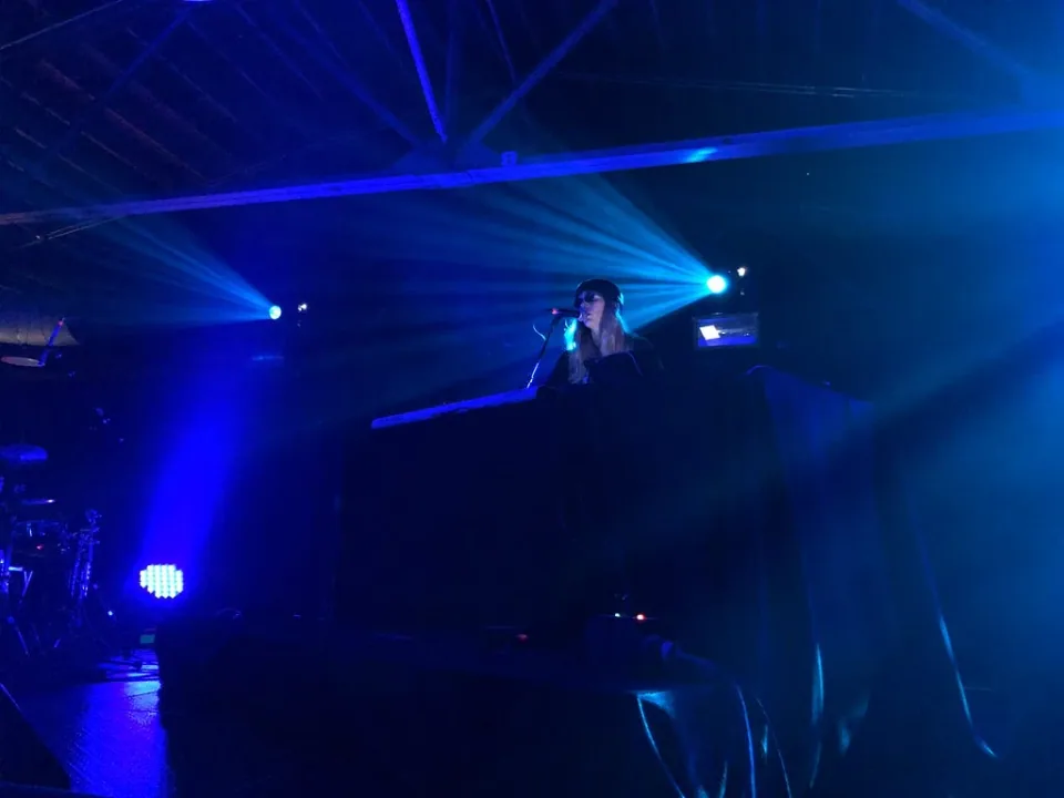 A blue-lit stage at the Big Ears Festival
