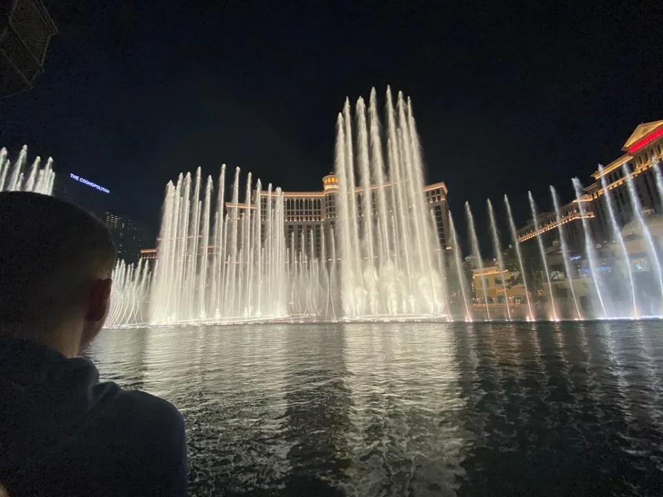 The Bellagio fountains lit up at night