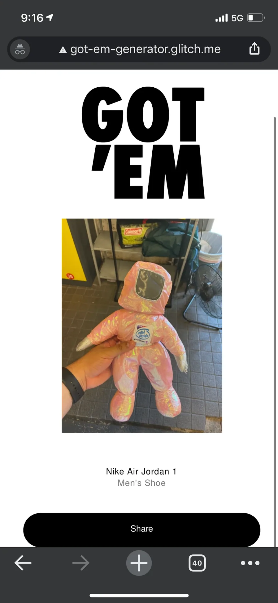 A hand holding a toy character, added to the SNKRS mockup